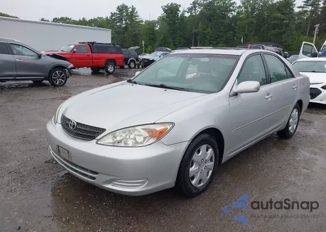 2002 Toyota Camry Xle z USA, uszkodzony, nr VIN 4T1BE30K92U612119